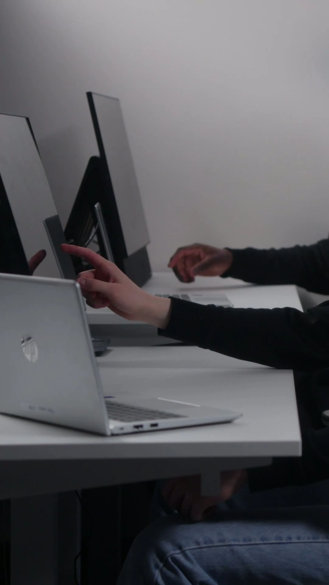 A member of the operations team reviewing a flight on a laptop